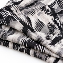 RINASCIMENTO — Patterned fabric detail. Representative image