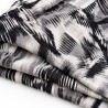 RINASCIMENTO — Patterned fabric detail. Representative image